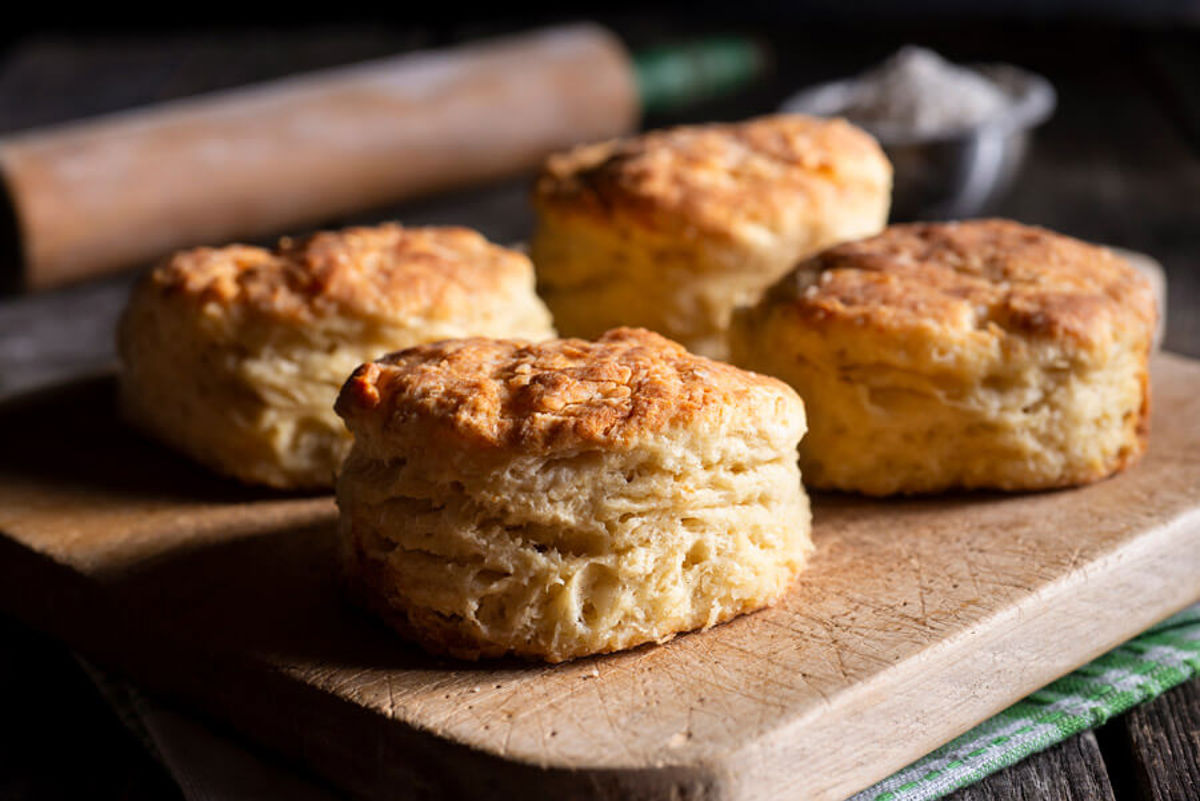 Scones and sandwiches on an afternoon tea stand